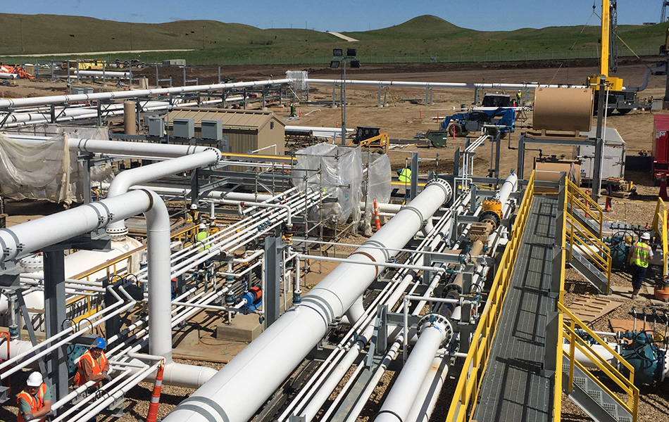 Pipeline processing equipment at a midstream facility