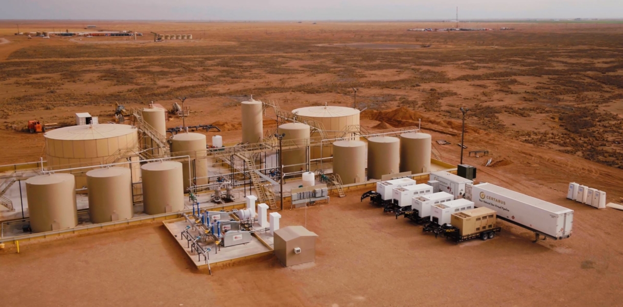 Multiple pumpjacks operating at sunset