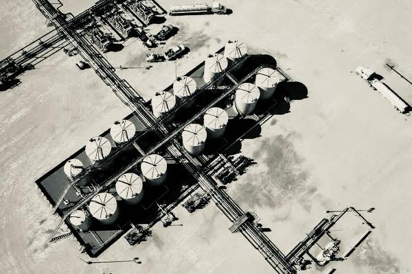 Oil field operations at sunset